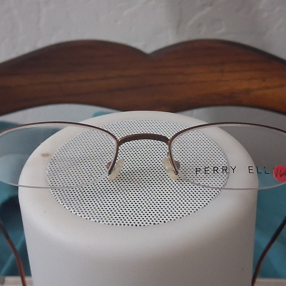 Perry Ellis Minimalist Rimless Glasses with Silver Detail